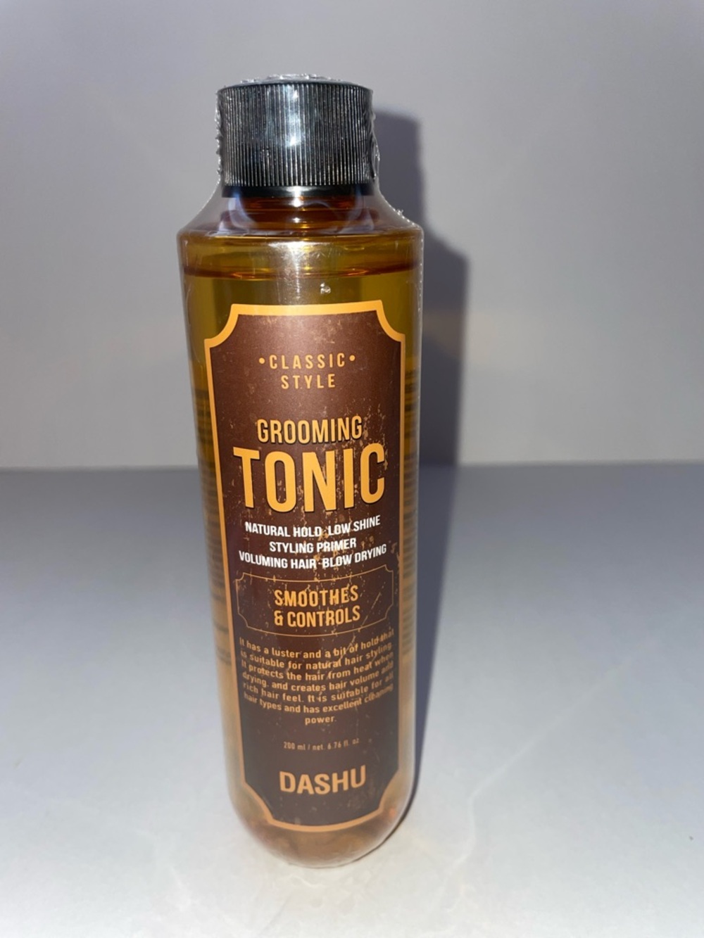 Ash Brown & Black Grooming Tonic Bottle